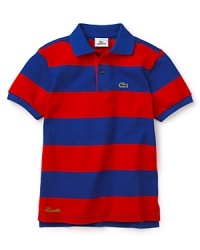 An iconic classic: the Lacoste polo shirt with bold stripes and the signature alligator embroidery at the chest. An iconic classic: the Lacoste polo shirt with bold stripes and the signature alligator embroidery at the chest.