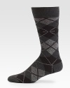 A complementary addition to your wardrobe essentials, in a modernized argyle pattern knitted in a lightweight cotton blend.Mid-calf height66% cotton/20% modal/12% polyamide/2% elastaneMachine washMade in Italy