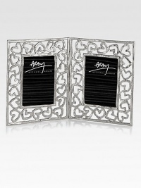 Finding inspiration from the imagery that floats around classic storytelling, this charming double frame is crafted from hand-forged, nickel-plated metal by one of America's premier metalwork artists.From the Heart CollectionNickel-plated metalFits 2 X 3 photos7H X 4WImported