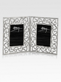 Finding inspiration from the imagery that floats around classic storytelling, this charming double frame is crafted from hand-forged, nickel-plated metal by one of America's premier metalwork artists.From the Heart CollectionNickel-plated metalFits 2 X 3 photos7H X 4WImported Finding inspiration from the imagery that floats around classic storytelling, this charming double frame is crafted from hand-forged, nickel-plated metal by one of America's premier metalwork artists.From the Heart CollectionNickel-plated metalFits 2 X 3 photos7H X 4WImported