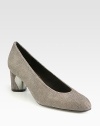 Goose-bump textured leather style is sleek and streamlined, finished with a chunky, metal accented heel.Covered heel, 2¼ (55mm)Textured leather upperUltrasuede liningPadded insoleLeather soleMade in SpainAdditional InformationShipping timeline for this item Women's Shoe Size Guide (International Equivalents) This item cannot be shipped via Rush, Next Business Day, Saturday delivery.This item cannot be shipped to a P.O. Box, APO/FPO or U.S. Territory. 