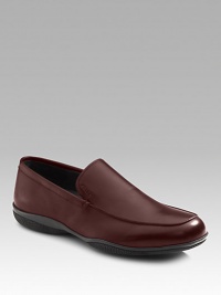 Soft calfskin slip-on has comfortable rubber sole with red stripe logo detail. Leather lining Padded insole Made in Italy Soft calfskin slip-on has comfortable rubber sole with red stripe logo detail. Leather lining Padded insole Made in Italy