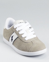 Ralph Lauren Childrenswear's perforated suede sneaker works with chinos, jeans and shorts, imbuing each with an undeniable heritage appeal. Ralph Lauren Childrenswear's perforated suede sneaker works with chinos, jeans and shorts, imbuing each with an undeniable heritage appeal.