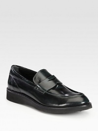 Sleek, polished moccasin style is beautifully crafted in fine Italian leather.Leather upperLeather liningPadded insoleRubber soleMade in Italy Sleek, polished moccasin style is beautifully crafted in fine Italian leather.Leather upperLeather liningPadded insoleRubber soleMade in Italy
