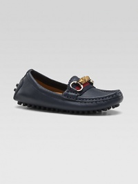 A slip-on style with a grown-up look and lots of Gucci details, including striped webbing, a bamboo horsebit and a sophisticated driver sole.Leather upperStriped webbed detailBamboo horsebit with golden hardwareRubber driver soleMade in Italy A slip-on style with a grown-up look and lots of Gucci details, including striped webbing, a bamboo horsebit and a sophisticated driver sole.Leather upperStriped webbed detailBamboo horsebit with golden hardwareRubber driver soleMade in Italy