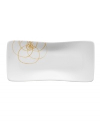 A modern canvas for everyday meals, the Bloom Sun rectangular plates have a smooth, flat surface that's artfully scribbled with golden florals for a look that's fresh--and in durable porcelain--not fussy. From Villeroy & Boch.