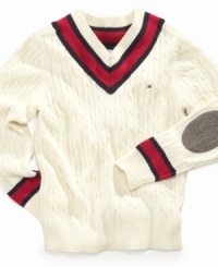 Ready for the country club. He'll look debonair when donning this classic cable knit sweater by Tommy Hilfiger. Ready for the country club. He'll look debonair when donning this classic cable knit sweater by Tommy Hilfiger.