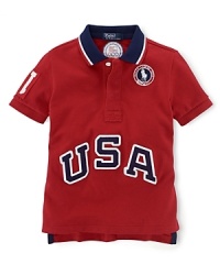 This breathable cotton mesh polo celebrates Team USA's participation in the 2012 Olympics with bold graphics and embroidery. This breathable cotton mesh polo celebrates Team USA's participation in the 2012 Olympics with bold graphics and embroidery.