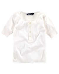 A classic Henley shirt is rendered in luxuriously soft cotton. A classic Henley shirt is rendered in luxuriously soft cotton.