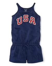 A red, white and blue design with USA patching gives a preppy, all-American look to a pretty warm-weather romper in celebration of Team USA's participation in the 2012 Olympics. A red, white and blue design with USA patching gives a preppy, all-American look to a pretty warm-weather romper in celebration of Team USA's participation in the 2012 Olympics.
