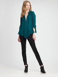 A delicate design made from sophisticated silk. This button-front top features a pleated, plunge front and convenient roll-tab sleeves. Collar neckRoll-tab sleevesDropped shouldersPleated frontButton frontAbout 26 from shoulder to hemSilkDry cleanImported Model shown is 5'10 (177cm) wearing US size Small. A delicate design made from sophisticated silk. This button-front top features a pleated, plunge front and convenient roll-tab sleeves. Collar neckRoll-tab sleevesDropped shouldersPleated frontButton frontAbout 26 from shoulder to hemSilkDry cleanImported Model shown is 5'10 (177cm) wearing US size Small.