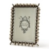 Olivia Riegel Elizabethan Pearl frame for a 4x6 photo. Elegant and refined, the frames faux pearls and intricate enamel banding recall the opulence of Tudor-Stuart England. With hand-set with Swarovski crystals and a decorative metal backside.
