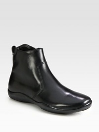 A casual dress boot designed in Italian calfskin leather with a side zip for off-and-on with ease.Leather upperPadded insoleRubber soleMade in Italy A casual dress boot designed in Italian calfskin leather with a side zip for off-and-on with ease.Leather upperPadded insoleRubber soleMade in Italy