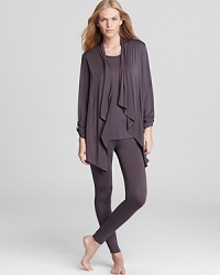 Curl up in this soft set from DKNY, featuring a one-piece shell and cardigan, along with matching leggings for total comfort. Curl up in this soft set from DKNY, featuring a one-piece shell and cardigan, along with matching leggings for total comfort.