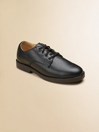 Classic oxfords, just like dad's, belong in every young man's closet for those moments when sneakers just won't do.Four-grommet lace-up style Leather lining Padded insole Rubber sole Imported Classic oxfords, just like dad's, belong in every young man's closet for those moments when sneakers just won't do.Four-grommet lace-up style Leather lining Padded insole Rubber sole Imported