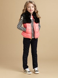 Fluffy faux fur adds fashionable fun to a cozy vest with a cute flare at the hem.Faux fur trim at front and back bodiceBold, golden front zip with J pullAngled zip pocketsFlared hemFully linedNylon shell; acrylic faux furDry cleanImported Fluffy faux fur adds fashionable fun to a cozy vest with a cute flare at the hem.Faux fur trim at front and back bodiceBold, golden front zip with J pullAngled zip pocketsFlared hemFully linedNylon shell; acrylic faux furDry cleanImported