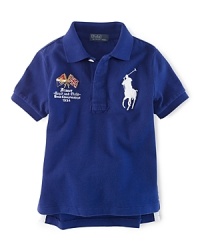A preppy short-sleeved polo shirt in breathable cotton mesh is accented with country embroidery, celebrating Team USA's participation in the 2012 Olympics. A preppy short-sleeved polo shirt in breathable cotton mesh is accented with country embroidery, celebrating Team USA's participation in the 2012 Olympics.