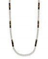 Trending tortoise. Not just for sunglasses anymore, Lauren by Ralph Lauren's chic long necklace features tortoise resin stations on a silver-plated steel chain. Approximate length: 36 inches.