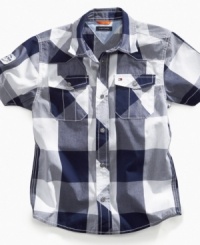 Dial up some warm-weather style with this short-sleeved plaid shirt from Tommy Hilfiger. Dial up some warm-weather style with this short-sleeved plaid shirt from Tommy Hilfiger.