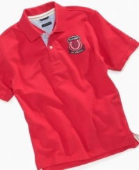 A classic pique polo goes graphic. Pair this instant favorite from Tommy Hilfiger with tried-and-true chinos for unparallelled preppy style. A classic pique polo goes graphic. Pair this instant favorite from Tommy Hilfiger with tried-and-true chinos for unparallelled preppy style.
