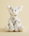 An adorable giraffe doll is adorned with playful dots.