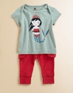 A plush cotton, short-sleeved tee paired with cozy pants will inspire visions of beautiful mermaids swimming under the sea. Shirt Envelope necklineShort sleevesPullover style Pants Elastic waistbandPatch pocketsRibbed leg bandsCottonMachine washImported