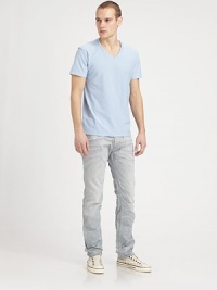 Slim-fitting silhouette, in a uniquely distressed, light-wash for a completed casual feel.Five-pocket styleInseam, about 33CottonMachine washImported Slim-fitting silhouette, in a uniquely distressed, light-wash for a completed casual feel.Five-pocket styleInseam, about 33CottonMachine washImported