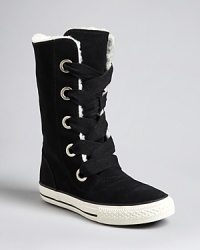 Microsuege, thick laces and oversized eyelets make the Beverly tall sneakers from Converse super-hip, and the fleece lining gives them cool-weather versatility. Microsuege, thick laces and oversized eyelets make the Beverly tall sneakers from Converse super-hip, and the fleece lining gives them cool-weather versatility.