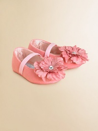 A large fabric flower blooms on the vamp of these charming ballet flats with elastic strap for easy on and off.Slip-on with elastic strapPolyurethane upperSatin liningPolyurethane solePadded insoleImported