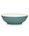 Make everyday meals a little more fun with Colorwave dinnerware from Noritake. Mix and match this rim soup bowl in turquoise and white with coupe and square pieces for a tabletop that's endlessly stylish.