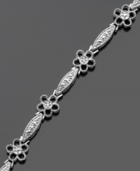 Give your style a boost with this cheerful flower bracelet featuring sparkling diamond accents. Victoria Townsend design crafted in sterling silver. Approximate length: 7 inches. Give your style a boost with this cheerful flower bracelet featuring sparkling diamond accents. Victoria Townsend design crafted in sterling silver. Approximate length: 7 inches.
