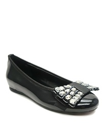 A sleek ballet flat is updated with an oversized rhinestone-encrusted bow, for a glamorous look guaranteed to wow. A sleek ballet flat is updated with an oversized rhinestone-encrusted bow, for a glamorous look guaranteed to wow.