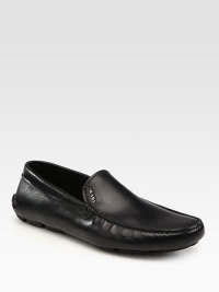 Supple Italian calfskin with comfortable rubber gripper soles and a silver logo accent. Leather lining Padded insole Leather sole Made in Italy Supple Italian calfskin with comfortable rubber gripper soles and a silver logo accent. Leather lining Padded insole Leather sole Made in Italy