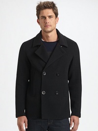 Remain stylish and warm this winter in this outerwear wardrobe essential, handsomely crafted in a luxurious wool and nylon blend for superior comfort.Button-frontWaist slash pocketsRear ventAbout 27 from shoulder to hem90% wool/10% nylonDry cleanImported Remain stylish and warm this winter in this outerwear wardrobe essential, handsomely crafted in a luxurious wool and nylon blend for superior comfort.Button-frontWaist slash pocketsRear ventAbout 27 from shoulder to hem90% wool/10% nylonDry cleanImported