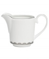 Vera Wang marries modern shapes with traditional lace in this set of dinnerware. The dishes are decidedly timeless. Platinum trim and banding add delicate feminine touches to this white bone china creamer.
