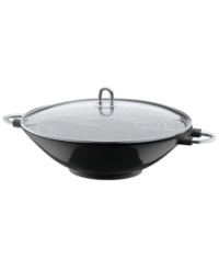 Make it wok. Every chef's staple in the kitchen, this versatile everyday do-it-all combines high, rounded sides with an enameled cast iron construction that heats up fast and dishes out delicious stir fry and more. The convenient wok rack lets you roast, steam and simmer veggies and meat at the same time, while the glass lid traps in moisture and flavor for unbelievable results. Make it wok. Every chef's staple in the kitchen, this versatile everyday do-it-all combines high, rounded sides with an enameled cast iron construction that heats up fast and dishes out delicious stir fry and more. The convenient wok rack lets you roast, steam and simmer veggies and meat at the same time, while the glass lid traps in moisture and flavor for unbelievable results.
