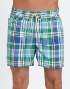 The classic Traveler swim short is rendered in sleek, quick-drying microfiber in a vibrant plaid pattern for cool, casual beach style.Elastic waistband with drawstring tie closureSide slash pocketsBack waist drainage grommetsBack flap patch pocketMesh liningInseam, about 4¾52% cotton/48% nylonMachine washImported