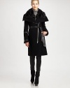 A jacket that offers a brilliant combination of buttery leather and luxurious toscana sheep fur. Its asymmetrical zipper adds to this style's sartorial mystique.Asymmetrical front zipperLambskin leather and fur detailsSlash pocketsSelf-tie beltFully linedAbout 40 from shoulder to hem70% wool/20% polyamide/10% cashmereDry clean by fur and leather specialistImported of Italian fabricFur origin: Turkey Model shown is 5'10 (177cm) wearing US size Small. 
