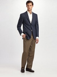 EXCLUSIVELY OURS. We've elevated the classic trouser to unseen heights with a smooth, remarkably lightweight wool silhouette that features an extended tab at the waist and sharp creases at the legs. Flat front Side slash, back welt pockets Unfinished hems Wool Dry clean Imported Additional Information Men's Pants, Shorts & Swimwear - Waist Sizing (European Equivalents) 