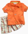 Time for an adventure! Get him ready to trek through his day in style and comfort with this cute safari polo shirt and short set from Blueberi Boulevard.