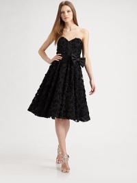 Sweet and feminine, this full-skirted strapless design is embellished with delicate allover flower appliqués.Strapless sweetheart necklineBanded waist with attached bowAllover flower appliquésConcealed back zipFully linedAbout 24 from natural waistPolyesterDry cleanMade in USA of imported fabricModel shown is 5'11 (180cm) wearing US size 4. Sweet and feminine, this full-skirted strapless design is embellished with delicate allover flower appliqués.Strapless sweetheart necklineBanded waist with attached bowAllover flower appliquésConcealed back zipFully linedAbout 24 from natural waistPolyesterDry cleanMade in USA of imported fabricModel shown is 5'11 (180cm) wearing US size 4.
