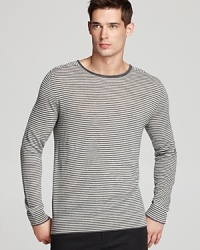 The thin stripe design of this lightweight sweater, crafted in a softer-than-soft blend of silk, cotton and cashmere, gives you a breezy, casual air as you look over the heirloom tomatoes at the farmer's market. The thin stripe design of this lightweight sweater, crafted in a softer-than-soft blend of silk, cotton and cashmere, gives you a breezy, casual air as you look over the heirloom tomatoes at the farmer's market.