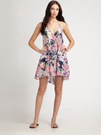 An easy, hi-low style with thin straps that delicately tie around the neck for a ultra-feminine, flirty look.V-neckRuffled hemCottonDry cleanImported An easy, hi-low style with thin straps that delicately tie around the neck for a ultra-feminine, flirty look.V-neckRuffled hemCottonDry cleanImported