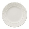 Edme dinner plate by Wedgwood. Wedgwood marks the 100th anniversary of its classic Edme collection with a refreshing update of its timeless pattern. A new antique white glaze enhances the elegant colannade embossment and laurel motif accent pieces. Sophisticated shapes and generously sized pieces make this pattern ideal for today's lifestyle.