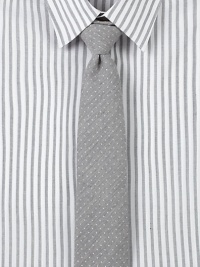 Slightly textured pindot tie adds finishing touches to any modern dress wardrobe.57% cotton/43% silkDry cleanMade in USA Slightly textured pindot tie adds finishing touches to any modern dress wardrobe.57% cotton/43% silkDry cleanMade in USA