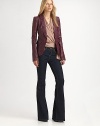 Supple lamb leather lends a hip, luxurious look to this blazer-style silhouette.Notch collarLong sleevesSingle front buttonSide flap pocketsBack tabBack ventAbout 21 from shoulder to hemFully linedLamb leatherDry clean with leather professionalImported of Italian leatherModel shown is 5'10 (177cm) wearing US size 4. 