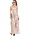 Tiny pleats amplify the metallic shimmer of Jessica Simpson's latest gown and a twist of fabric just below the bust makes the silhouette super flattering!