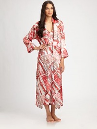 For a colorful, layered look try this long silhouette with a bold abstract print rendered in silky-smooth fabric. Foldover collarLong sleevesSelf-tie waistAbout 53 from shoulder to hemPolyesterMachine washImported For a colorful, layered look try this long silhouette with a bold abstract print rendered in silky-smooth fabric. Foldover collarLong sleevesSelf-tie waistAbout 53 from shoulder to hemPolyesterMachine washImported