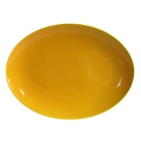This oval platter in a bright Lemon Peel is handcrafted in Germany from high fired ceramic earthenware that is dishwasher safe. Mix and match with other Waechtersbach colors to make a table all your own. This oval platter in a bright Lemon Peel is handcrafted in Germany from high fired ceramic earthenware that is dishwasher safe. Mix and match with other Waechtersbach colors to make a table all your own.