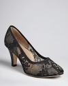 Flaunt the lace trend with every step in these elegant Anyi Lu pumps, with a sheer overlay that is sheerly sensational.